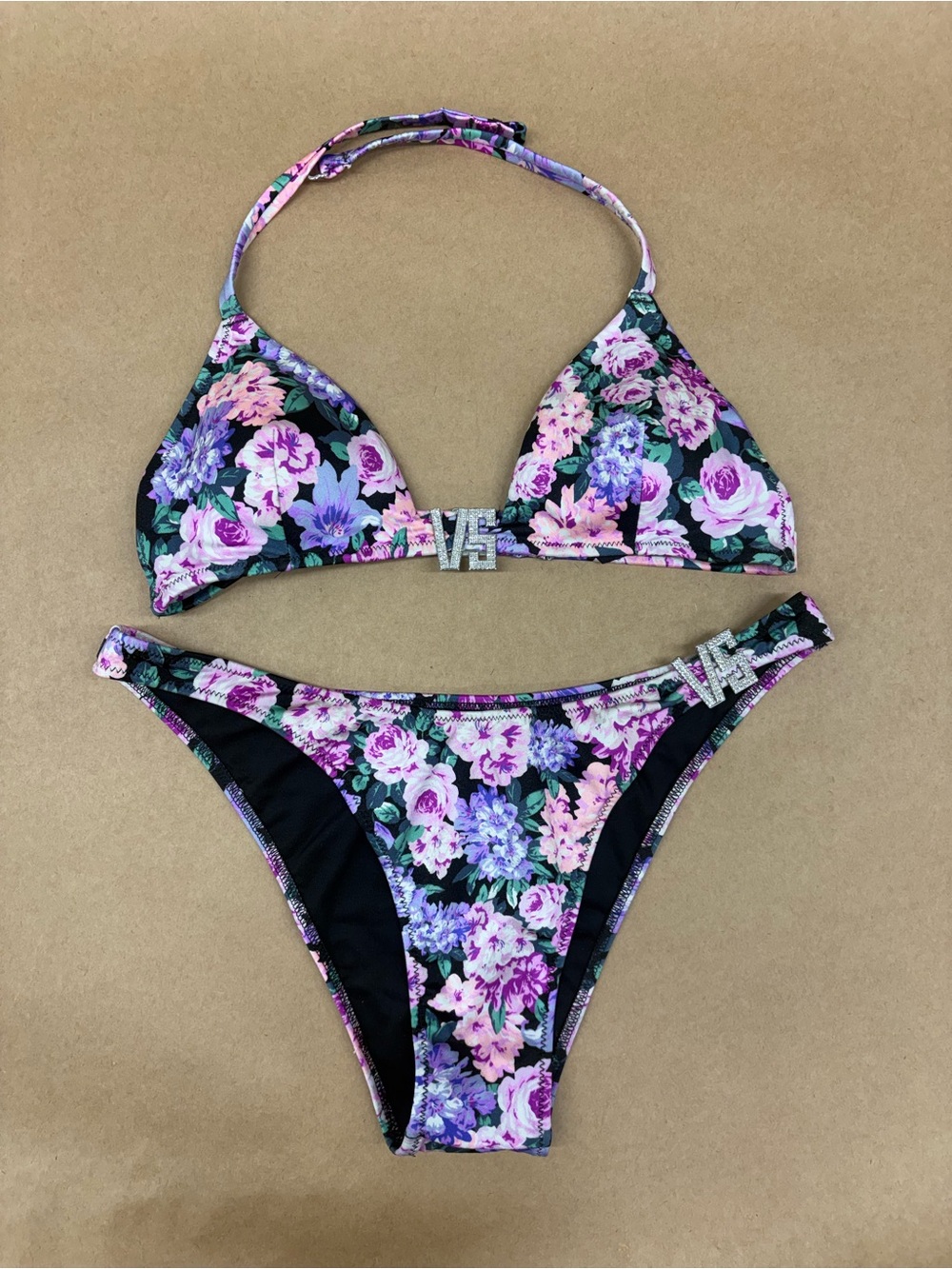 Victoria's Secret Floral Bikini with rhinestone ‘VS’ accents on top and bottom.